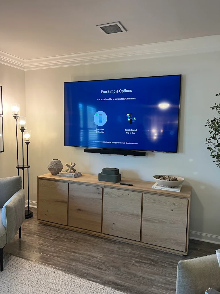 Large TV wall mount with soundbar in living room